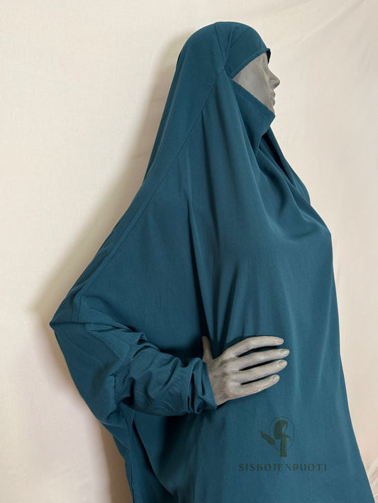 Teal 2-osainen lycra jilbab, sivusta kuvattuna – pehmeä ja tyylikäs hijab musliminaisille, helppo pukea päälle

